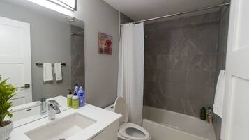 Hair dryer, towels, soap, shampoo