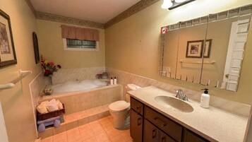 Shower, jetted bath, eco-friendly toiletries, hair dryer