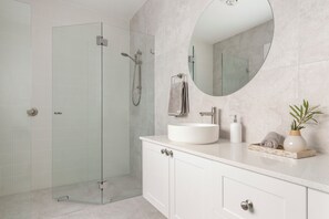 Shower, hair dryer, towels, soap - Ruby Jade Coastal Luxury at Anna Bay (Anna Bay)