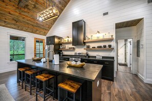 Fridge, microwave, oven, stovetop - Private Creek Cabin with Hot Tub, Bunk Room and Game Room (Broken Bow)