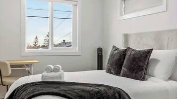 Iron/ironing board, travel crib, WiFi, bed sheets