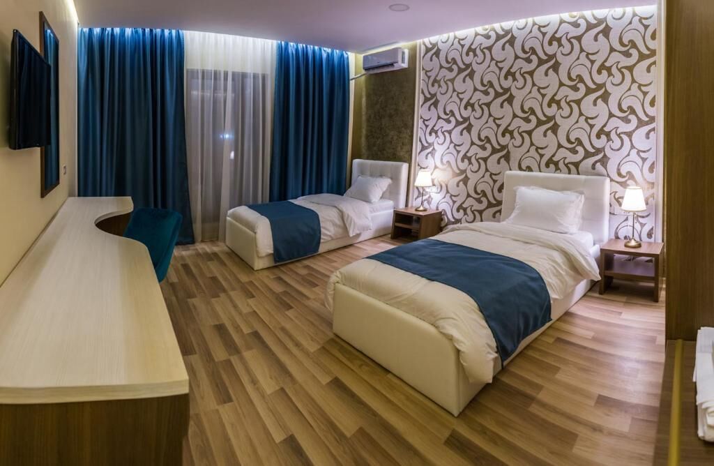 Deluxe Twin Room, City View | In-room safe, desk, blackout drapes, soundproofing