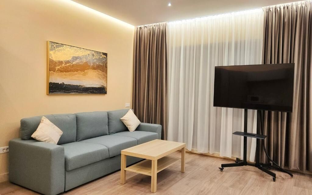 Studio Deluxe, balcon, vue ville | Coin séjour