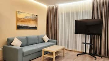 Studio Deluxe, balcon, vue ville | Coin séjour