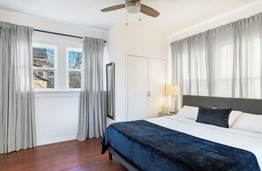 1 bedroom, desk, iron/ironing board, travel crib