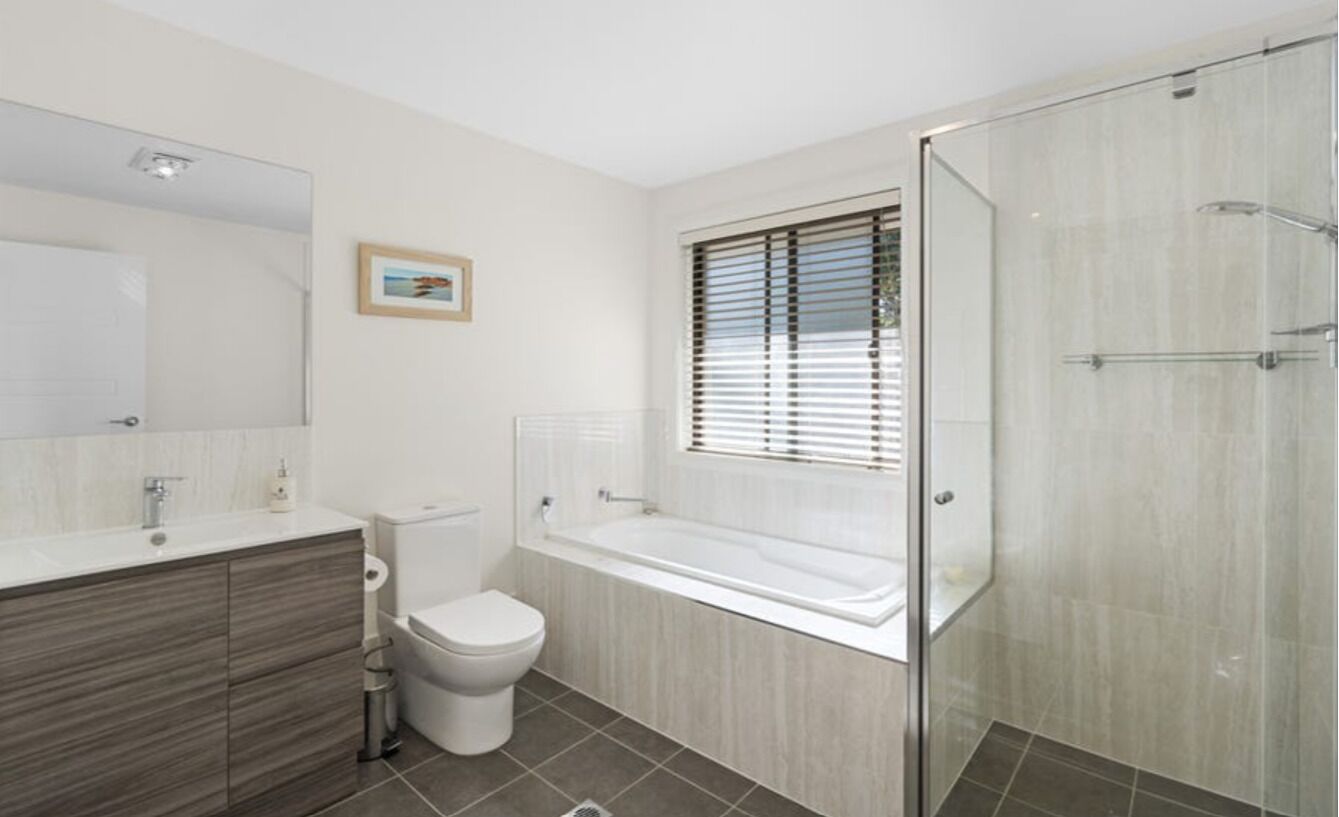 Shower, hair dryer, towels, toilet paper