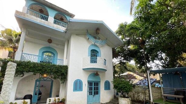 A two-story building with a pool in the foreground. - Makarios boutique hotel  (Calangute)