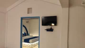 Family Quadruple Room, Balcony | In-room safe, blackout curtains, iron/ironing board