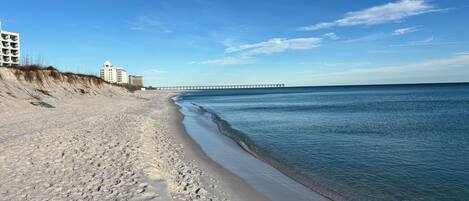 On the beach, sun loungers, beach towels