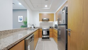 Deluxe-Apartment, Balkon, Stadtblick | Eigene Küche | Espressomaschine