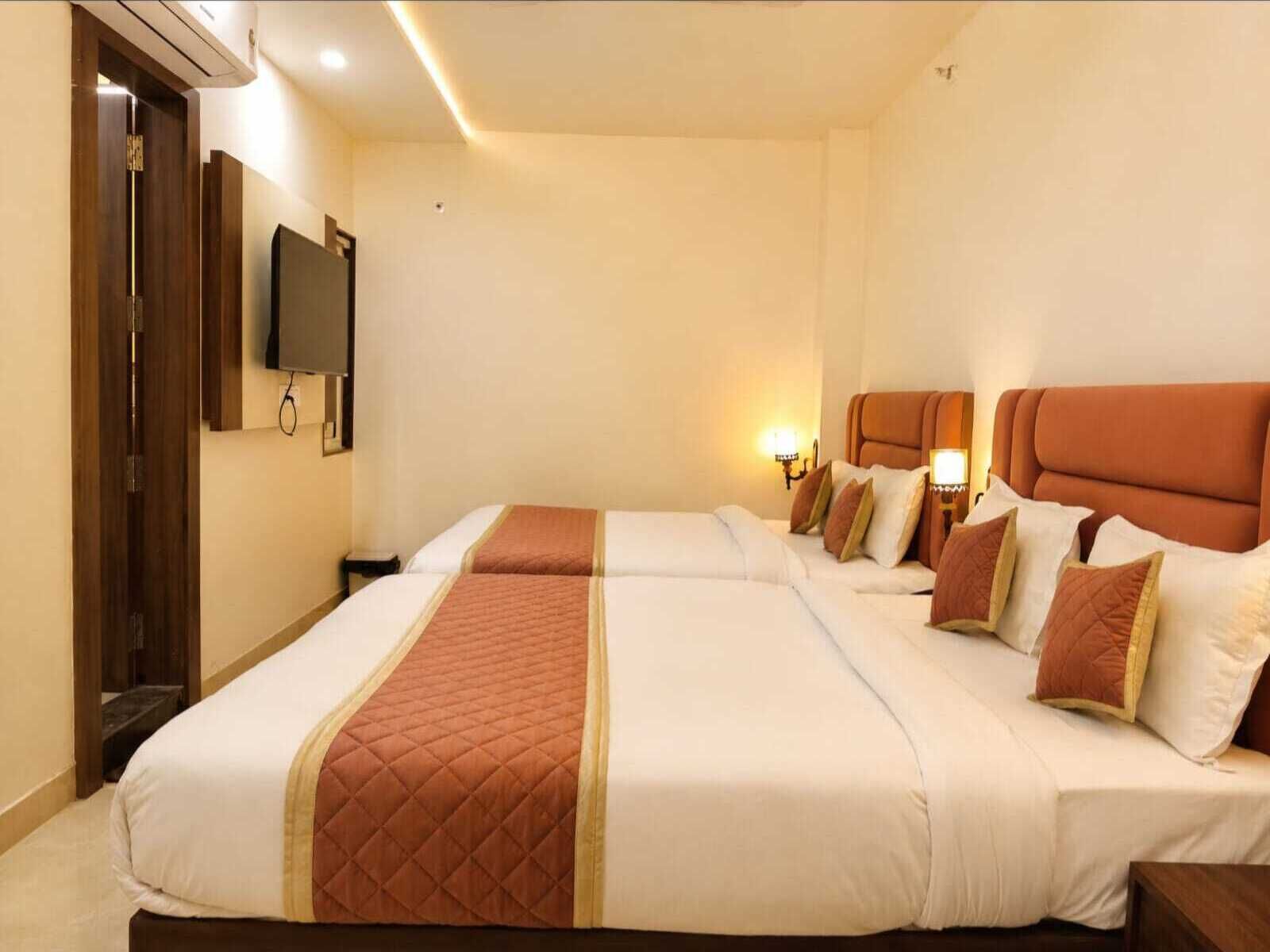 Premium bedding, desk, laptop workspace, soundproofing