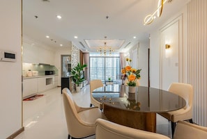 Three-Bedroom Apartment City View | Living area | LCD TV - Vinhomes Urban Apartment HCM (Ho Chi Minh City)