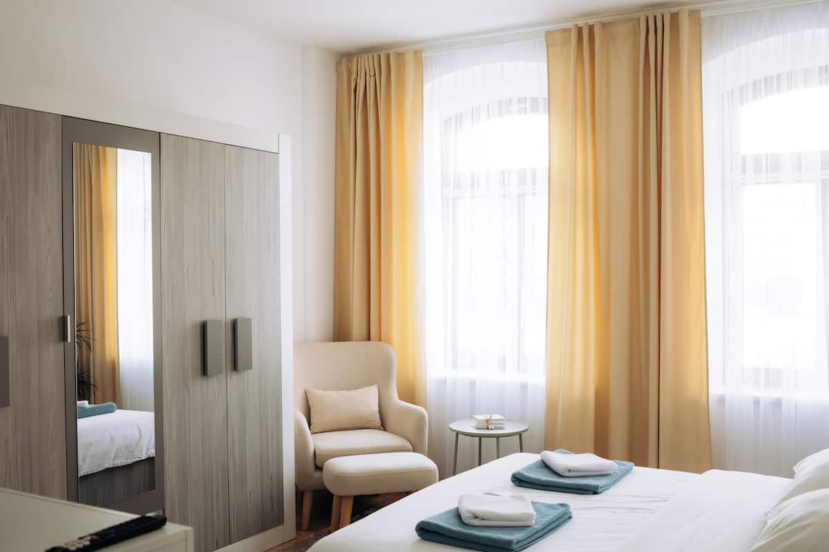 Deluxe Apartment, Balcony, Garden View | Desk, laptop workspace, iron/ironing board, free WiFi