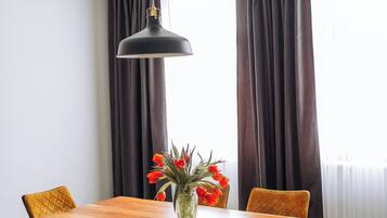 Apartment, Patio, City View | Desk, laptop workspace, iron/ironing board, free WiFi