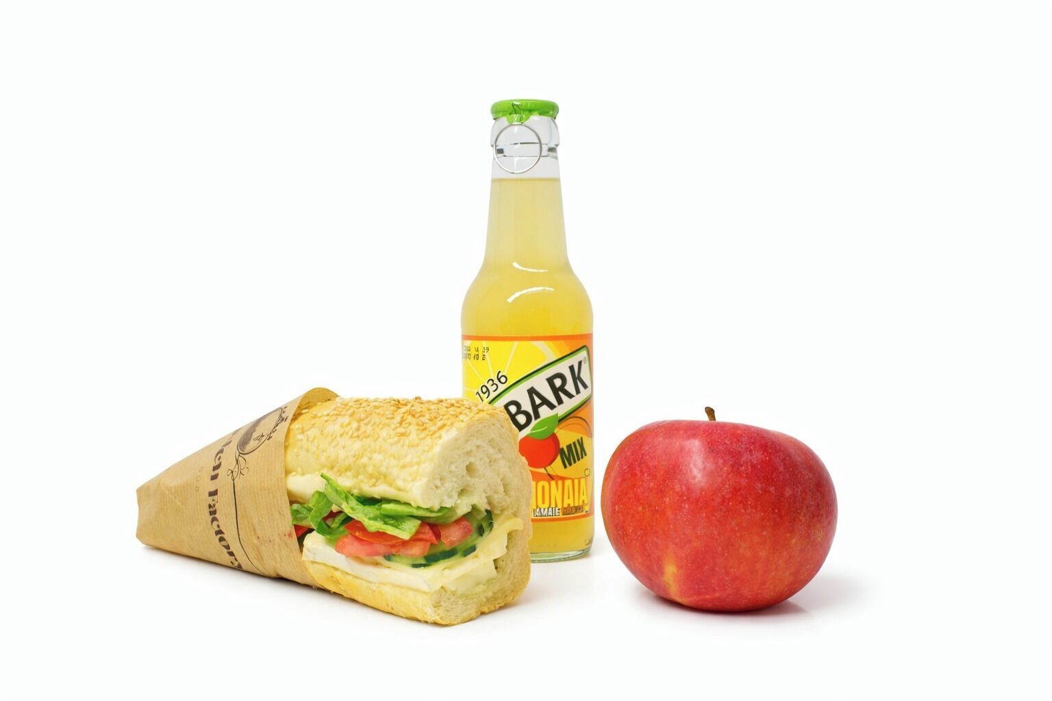 A sandwich, a bottle of juice, and an apple.