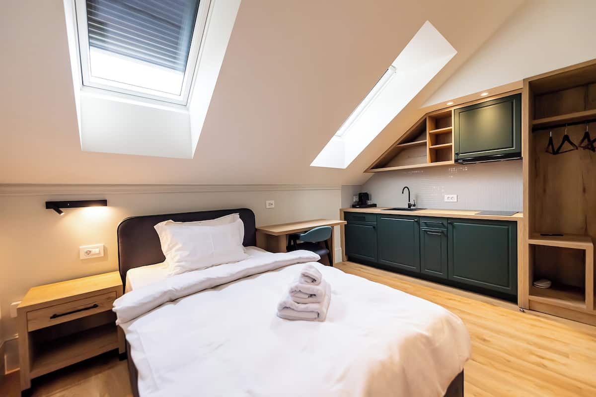 Habitación individual | Caja fuerte, escritorio, espacio para trabajar con un portátil