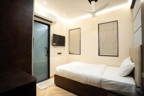 Habitació individual | Roba de llit d'alta qualitat, minibar i escriptori 
