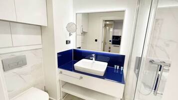 Apartment, Beach View | Bathroom | Hair dryer, towels