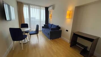 Departamento, vista a la playa | Área de sala de estar