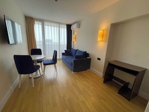 Apartment, Beach View | Living area - ORBİ CITY BİGEM APARTMENTS (Batum)