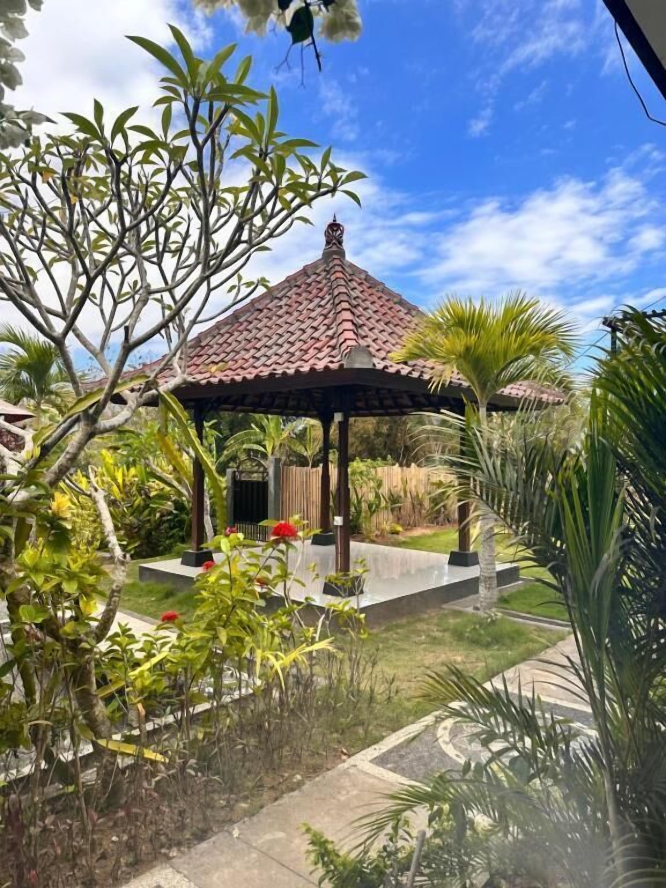 Habitación doble, balcón, vistas al jardín | Jardines del alojamiento