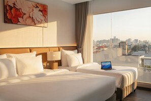 Executive Triple Room, City View | Minibar, in-room safe, laptop workspace, soundproofing - Sora Hotel Hanoi (Hoan Kiem)