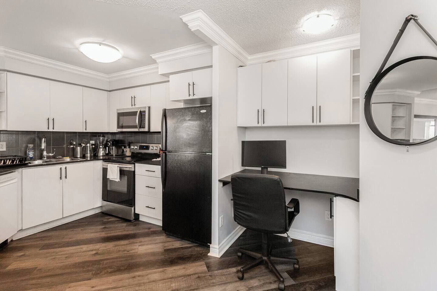 Fridge, dishwasher, coffee/tea maker, cookware/dishes/utensils