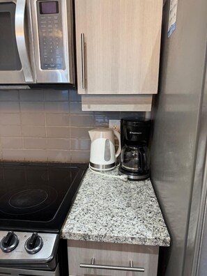 Fridge, microwave, oven, stovetop - Penthouse 2BR+Den | Skyline Views • SQ1 • Parking (Mississauga)
