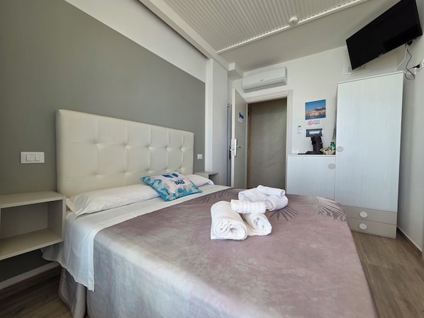 Panoramic Room, Terrace, Sea View | Minibar, in-room safe, individually decorated, individually furnished - Suite Torre Azzurra B&B Rooftop Sea View (Follonica)