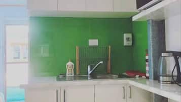 Fridge, microwave, coffee/tea maker, toaster