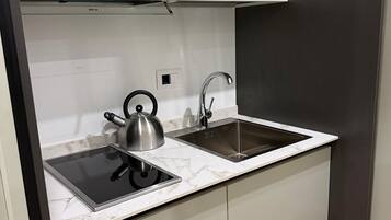 Dobbeltrom – premium, bakgårdsutsikt | Eget kjøkken