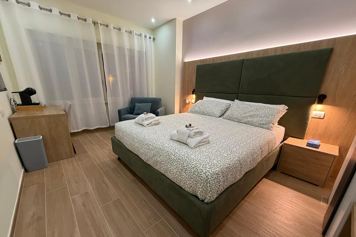 Premium Double Room, City View | In-room safe, blackout drapes, iron/ironing board, free WiFi