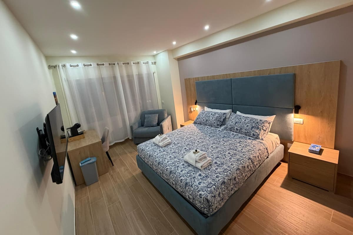 Premium Double Room, City View | In-room safe, blackout drapes, iron/ironing board, free WiFi