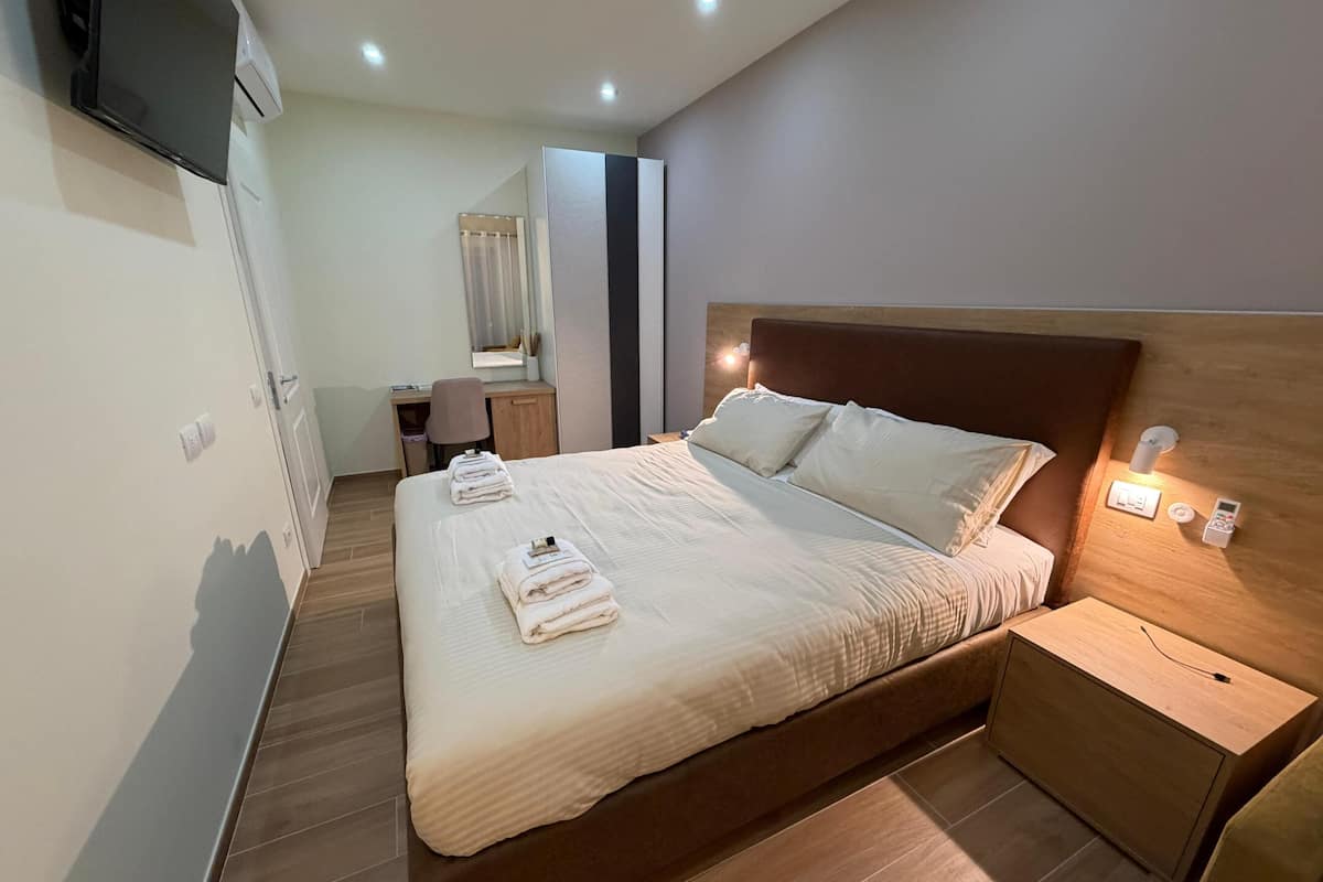 Premium Suite, City View | In-room safe, blackout drapes, iron/ironing board, free WiFi