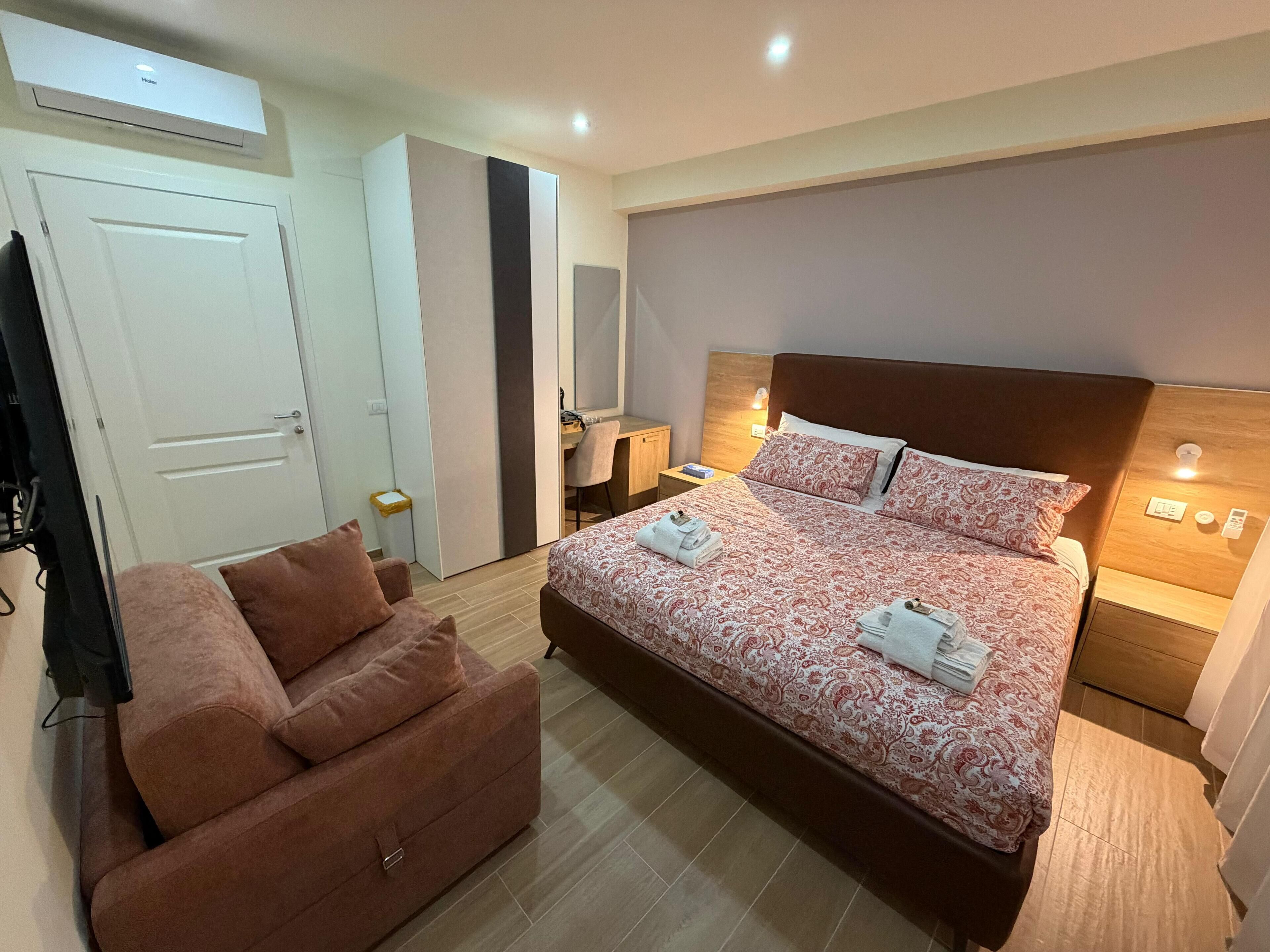 Premium Double Room, Courtyard View | In-room safe, blackout drapes, iron/ironing board, free WiFi