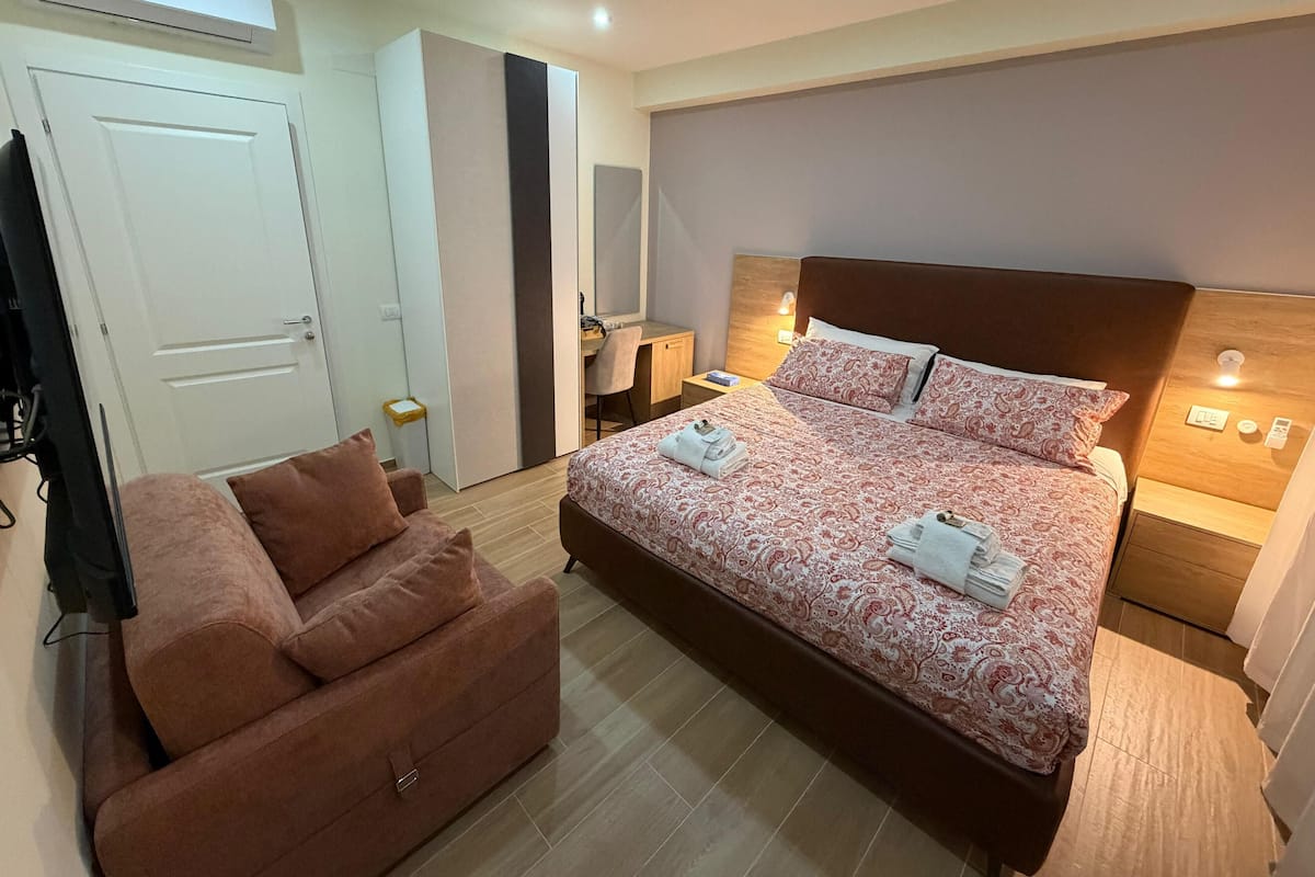Premium Double Room, Courtyard View | In-room safe, blackout drapes, iron/ironing board, free WiFi