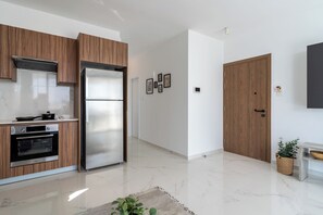 Apartment, 2 Bedrooms, Kitchen, City View | Private kitchen | Full-size fridge, microwave, oven, stovetop - Taupe 2-BR Apt. & Balcony in Larnaca (Livadia)