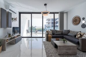 Appartement, 2 chambres, cuisine, vue ville | Coin séjour | TV connectée, Netflix, services de streaming