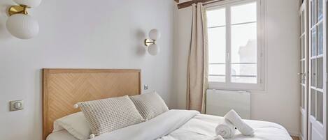 1 bedroom, desk, iron/ironing board, travel crib