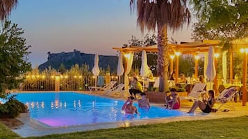 Outdoor pool, open 7:00 AM to 10:30 PM, pool umbrellas, sun loungers