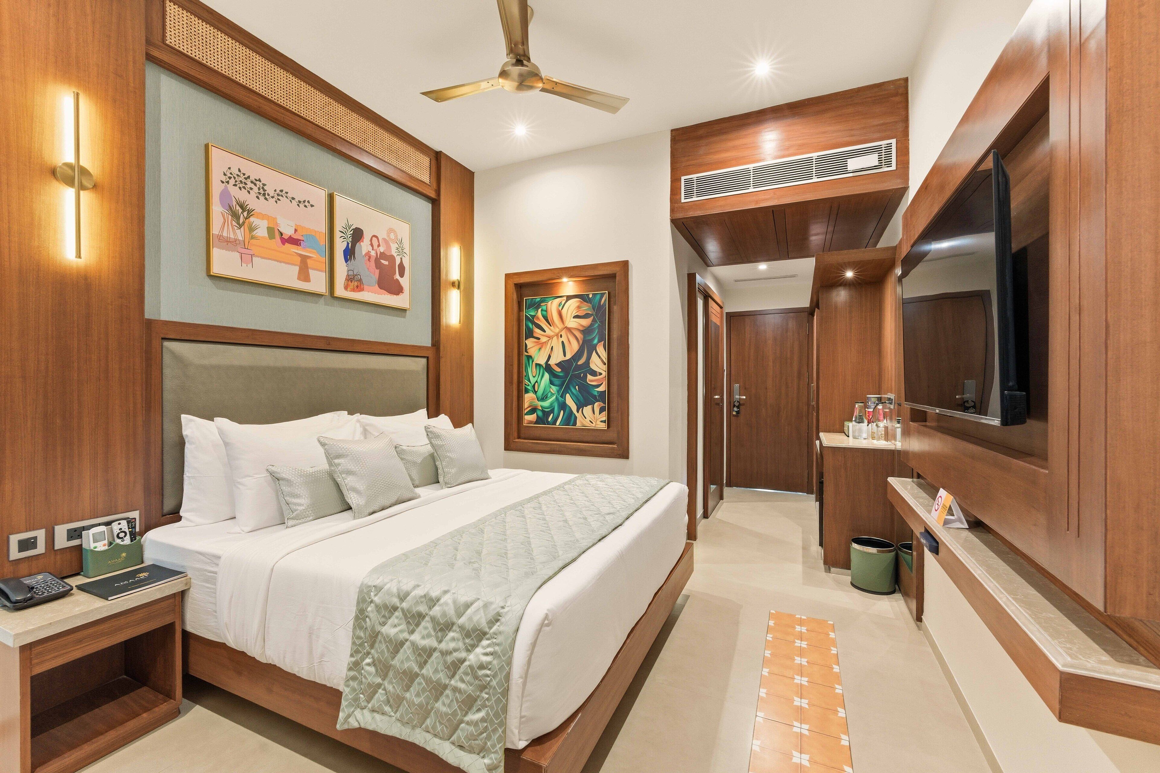 Habitación doble superior, vista parcial al océano | Sábanas de algodón egipcio, ropa de cama de alta calidad y edredón 