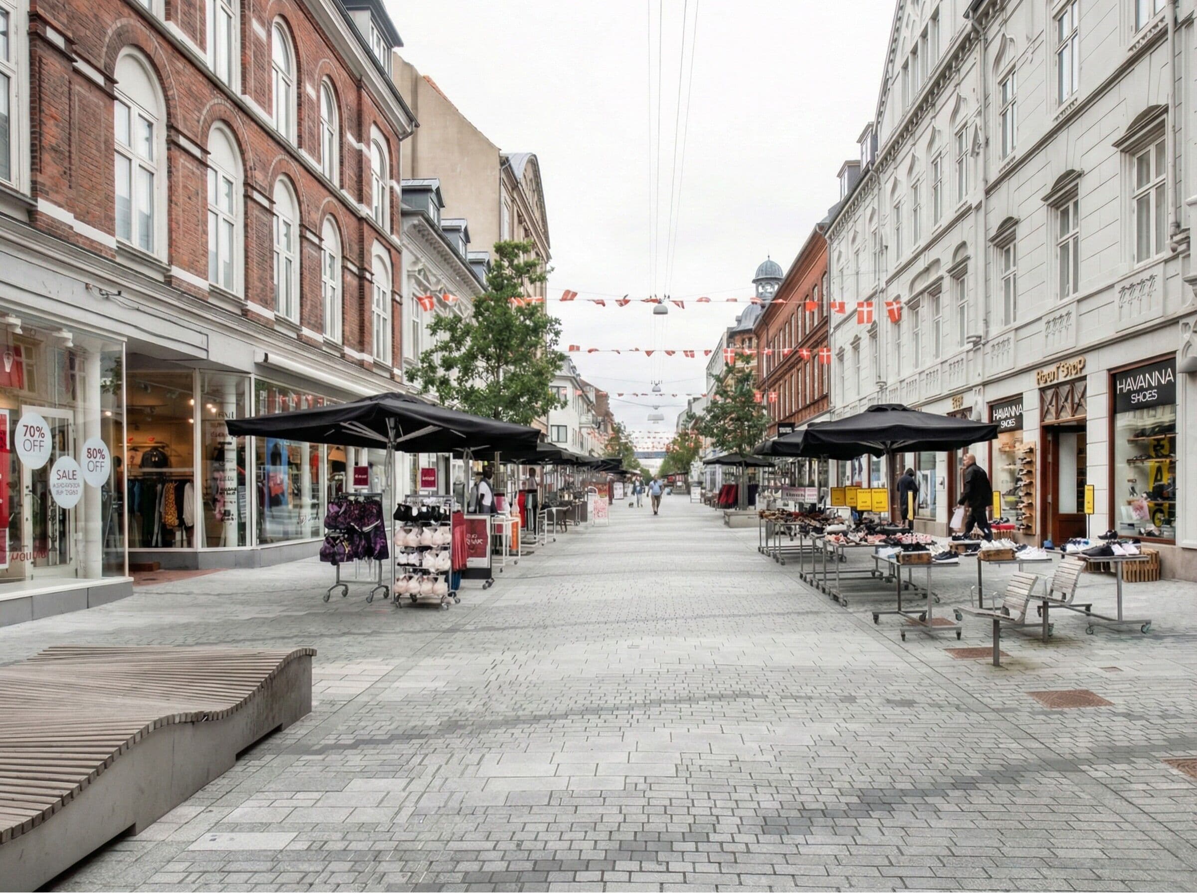 A pedestrian street lined with shops, including a shoe store named 'HAVANNA'.