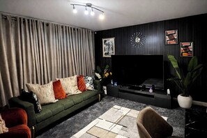 Asrama Umum, 1 kamar tidur, patio | Ruang keluarga