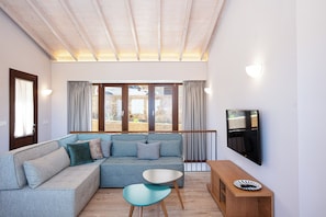 Premier Villa, 5 Bedrooms, Partial Sea View | Living room | 48-inch Smart TV with satellite channels, video-game console - Vardina Villa (Apokoronas)