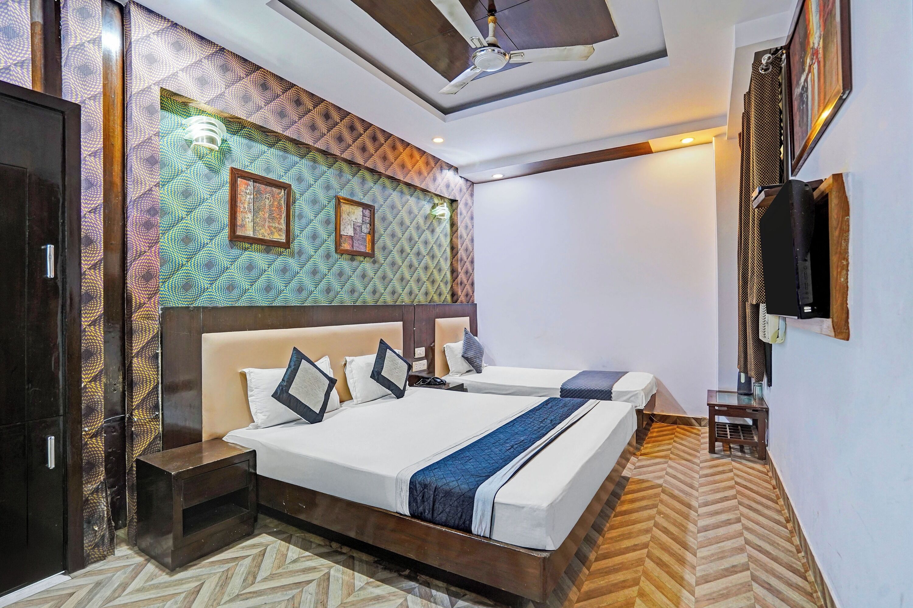 Habitació triple Deluxe | Escriptori, planxa i posts de planxar, wifi gratuïta i roba de llit 