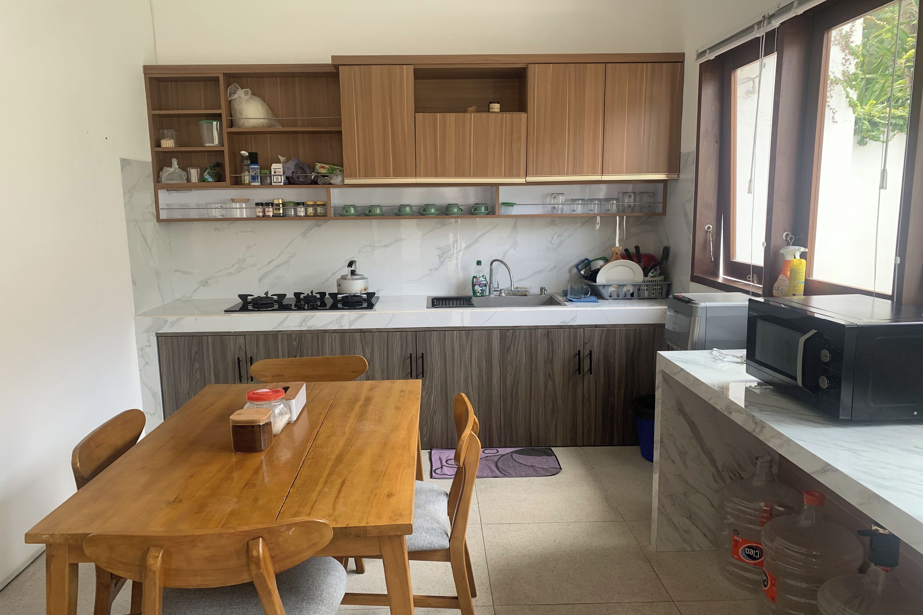Deluxe Double Room | Shared kitchen facilities | Fridge, microwave, dining tables