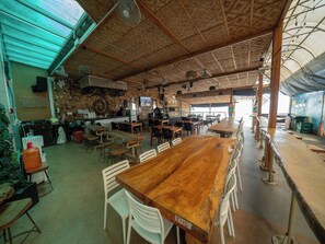 Breakfast, lunch, dinner served; local cuisine 