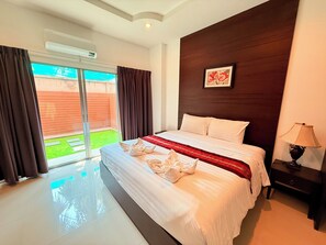Suite, Garden View | In-room safe, desk, iron/ironing board, free WiFi - T8 Exclusive Boutique Pattaya Hotel (Pattaya)