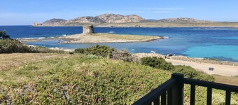 Functional 28 sq m room.Comprising a double bed, two single beds, and a private bathroom with shower, bidet, and hairdryer. The room also features an outdoor space with a sea view, a patio or terrace, and a table and chairs. Breakfast is included in the 