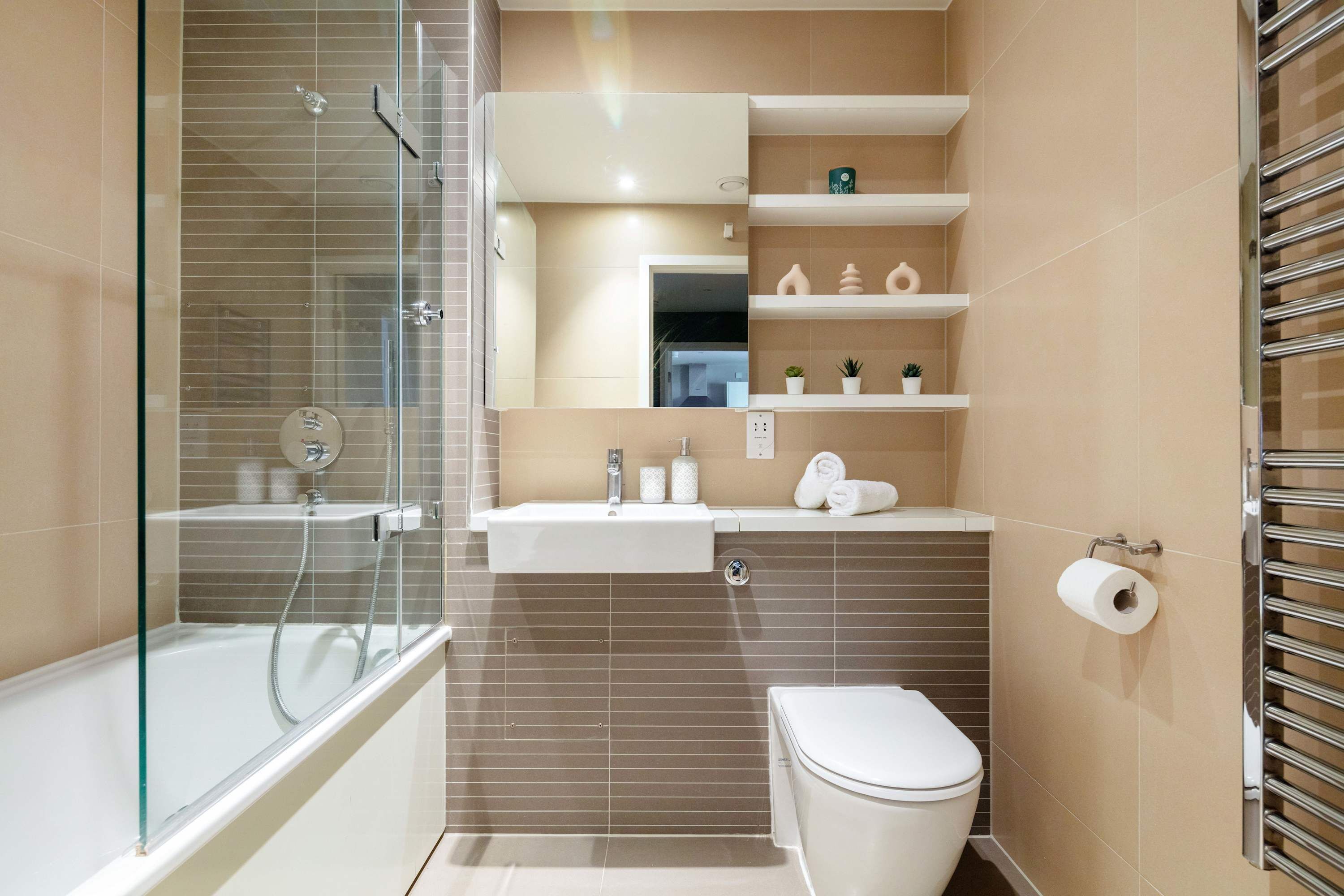Shower, hair dryer, towels, shampoo